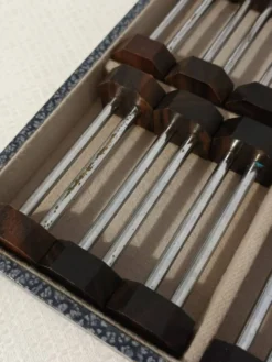 Coffret de 12 porte-couteaux Art déco