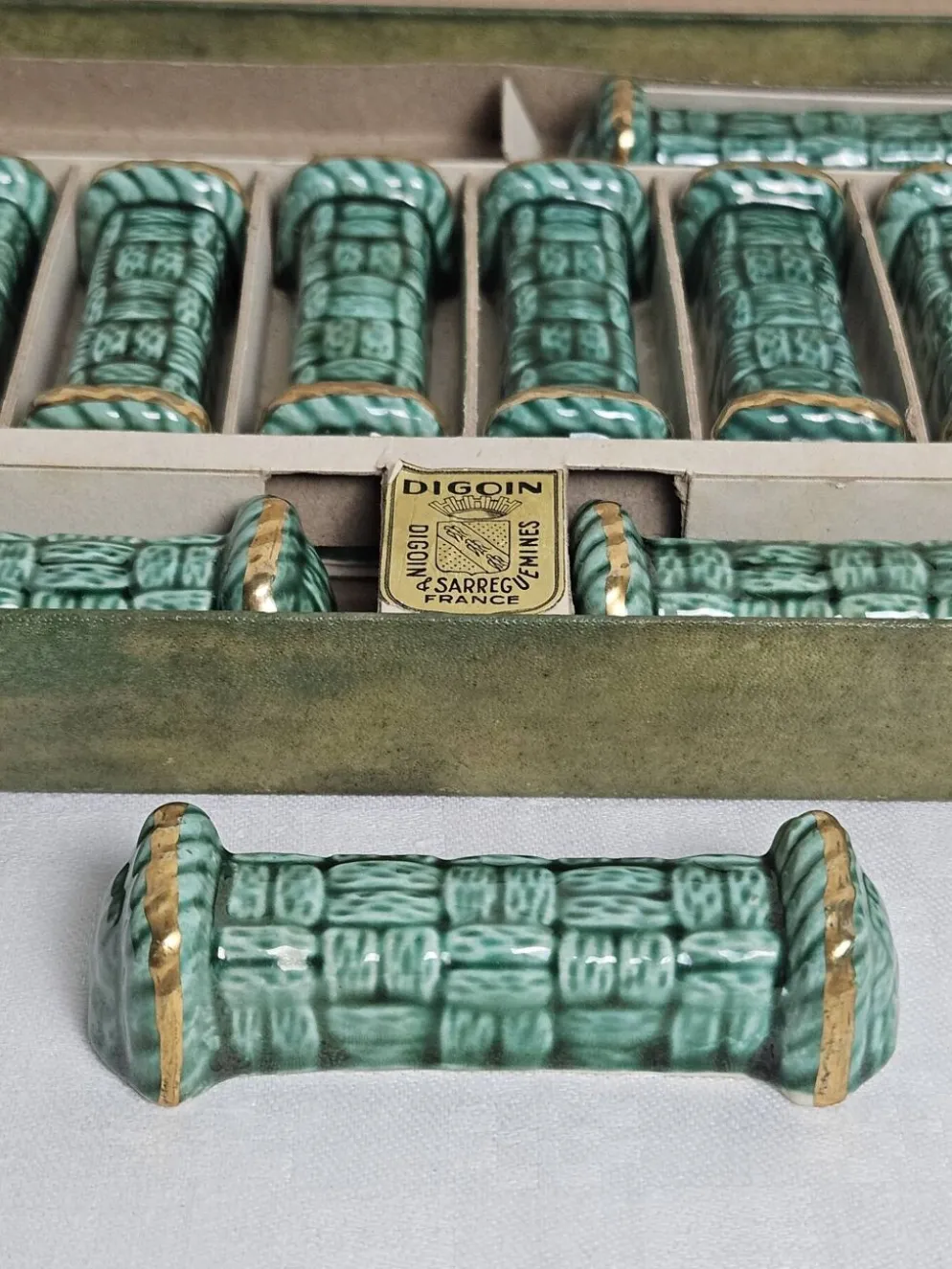 Coffret de 12 porte-couteaux Digoin Sarreguemines France