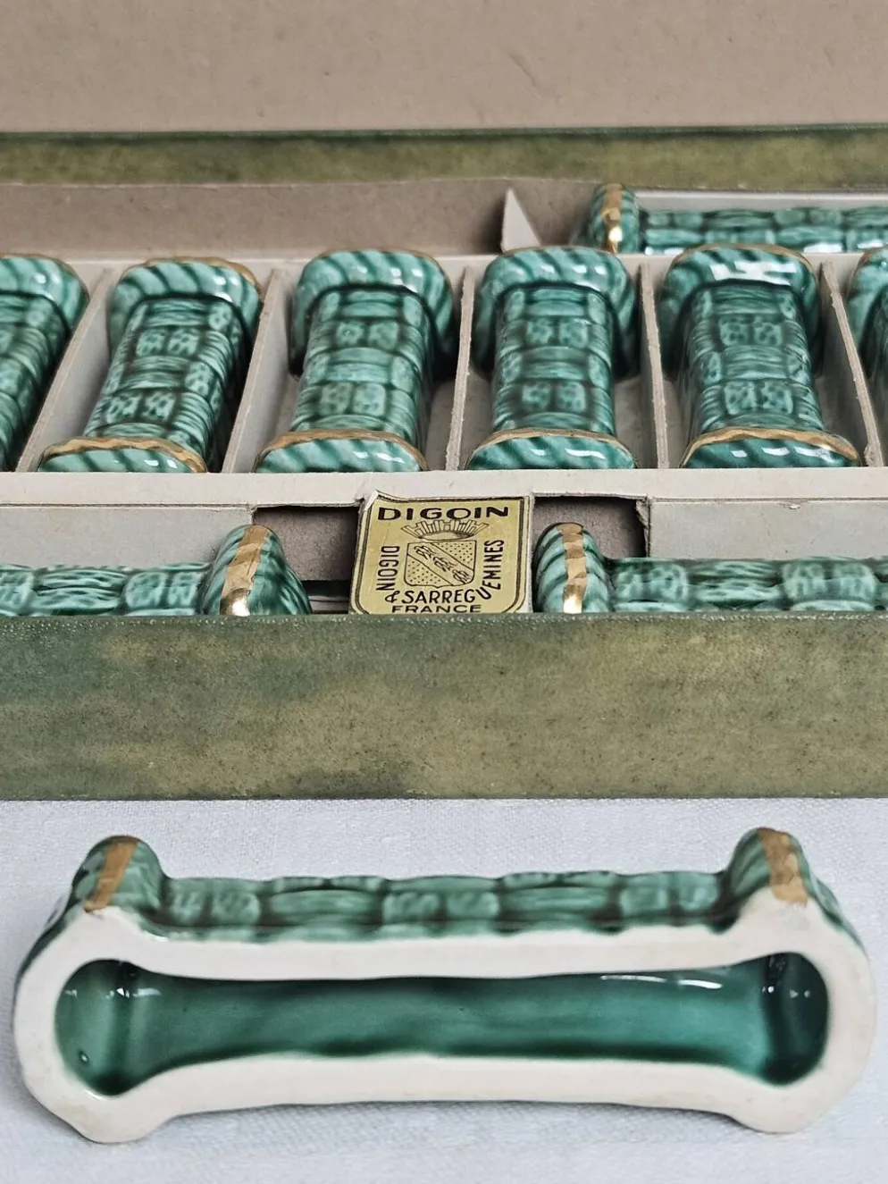 Coffret de 12 porte-couteaux Digoin Sarreguemines France