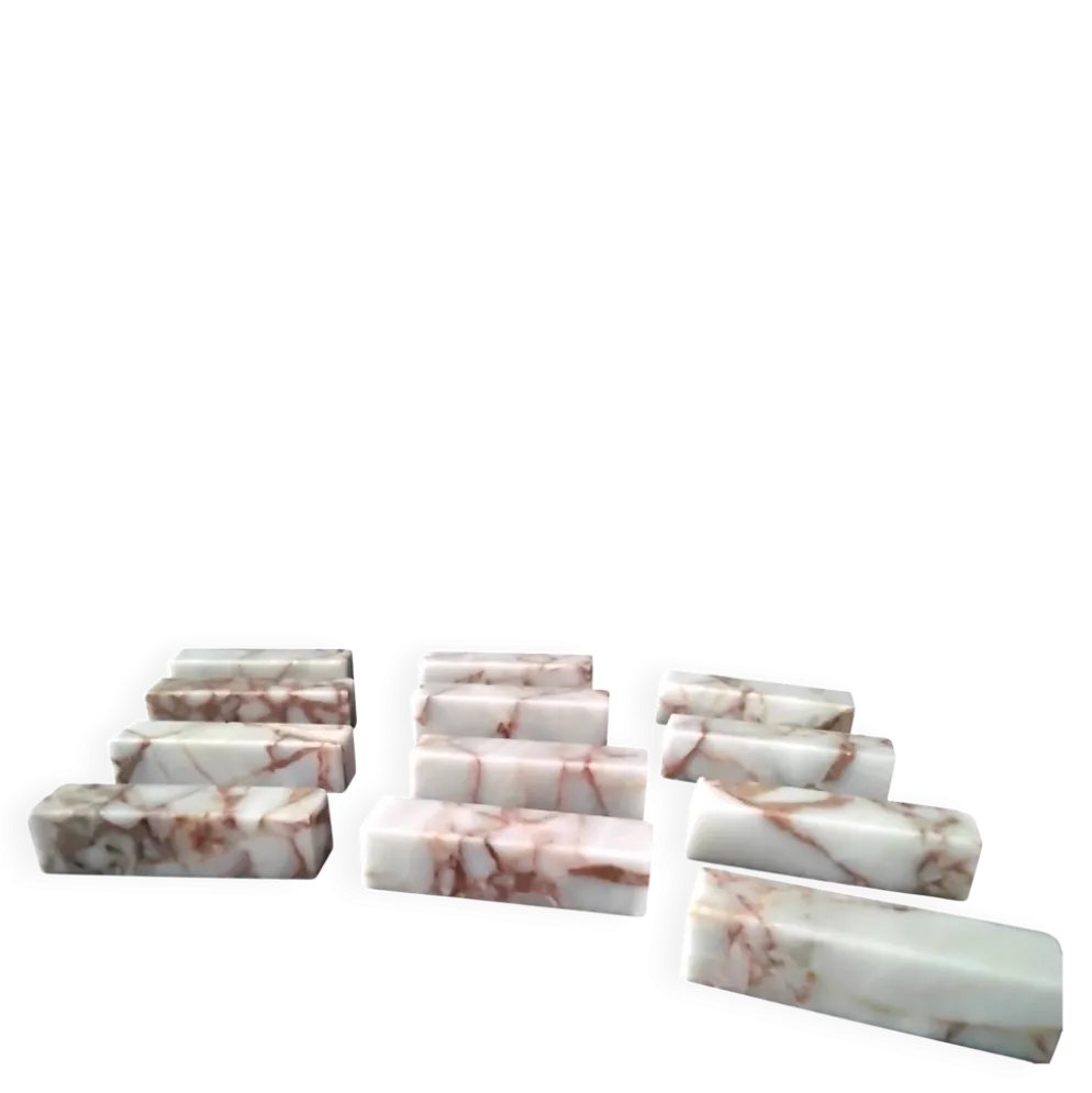 Coffret de 12 porte couteaux en marbre de couleur beige