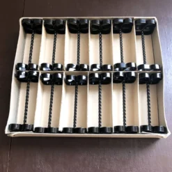 Coffret de 12 porte-couteaux ou couverts en fer forgé torsadé vintage