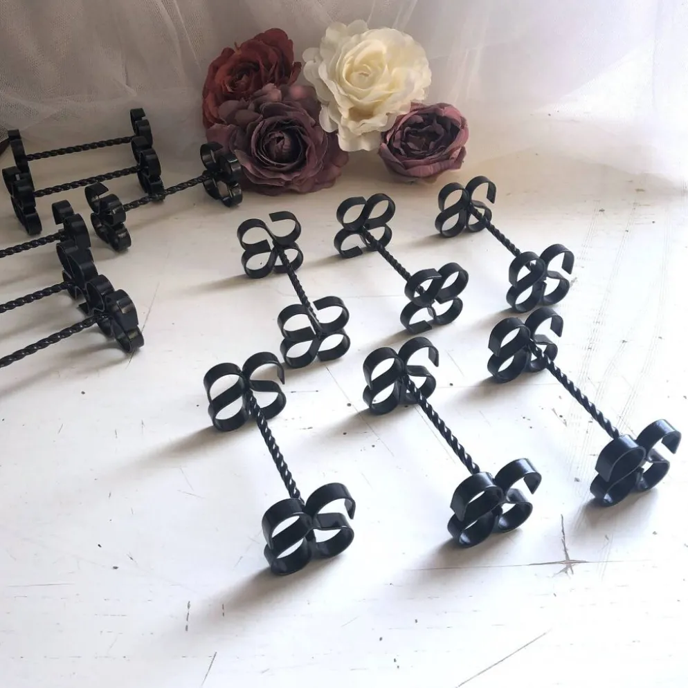 Coffret de 12 porte-couteaux ou couverts en fer forgé torsadé vintage