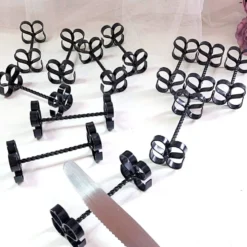 Coffret de 12 porte-couverts fer forgé