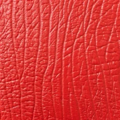 Coffre vintage en métal recouvert de cuir rouge, années 1950