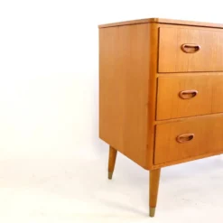 Commode en teck trois tiroirs