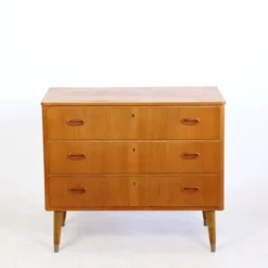 Commode en teck trois tiroirs