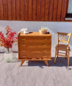 commode vintage aux pieds compas