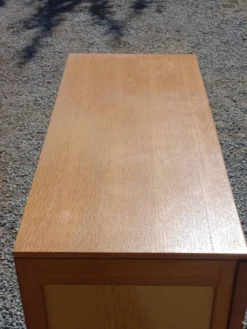 Commode vintage en chêne blond pieds compas 4 tiroirs des années 50