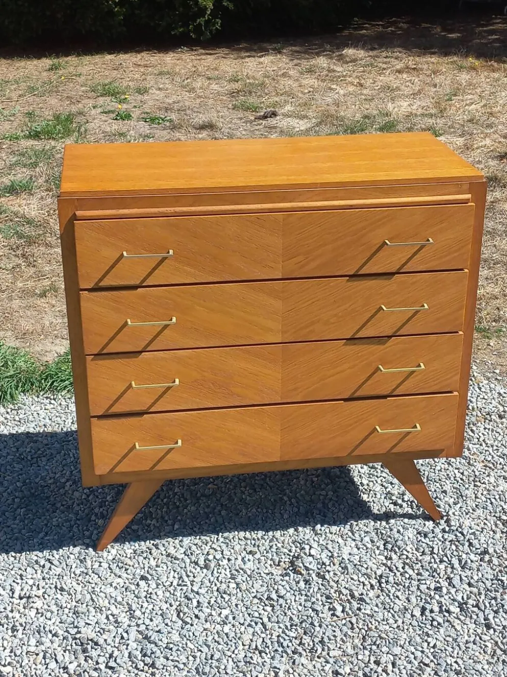 Commode vintage en chêne blond pieds compas 4 tiroirs des années 50