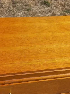 Commode vintage en chêne blond pieds compas 4 tiroirs des années 50