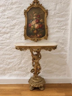 Console antique sculptée chérubin