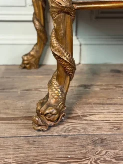 Console en bois doré, quatre pieds garnis de monstres marins, marbre brèche violette, vers 1900