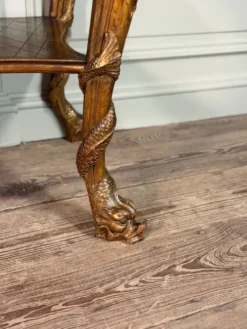 Console en bois doré, quatre pieds garnis de monstres marins, marbre brèche violette, vers 1900