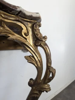 Console Louis XV en bois doré sculpté dessus marbre rouge