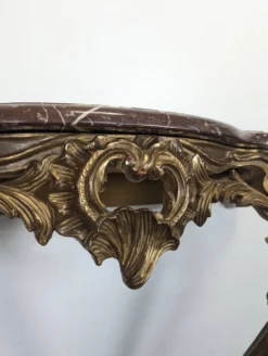 Console Louis XV en bois doré sculpté dessus marbre rouge