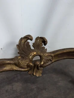 Console Louis XV en bois doré sculpté dessus marbre rouge