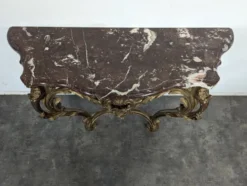 Console Louis XV en bois doré sculpté dessus marbre rouge