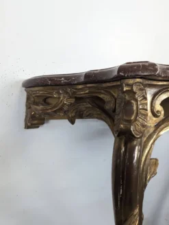 Console Louis XV en bois doré sculpté dessus marbre rouge