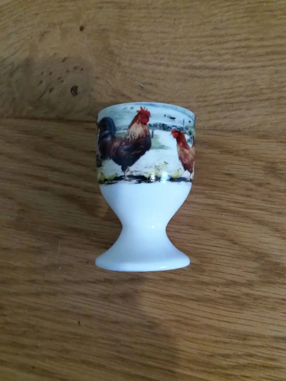 Coquetier faience blanche décor poule coq et poussins