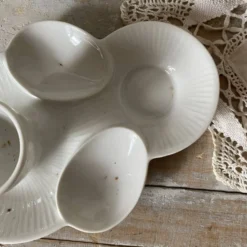 Coquetiers anciens en porcelaine Mehun
