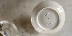 6 coquetiers fleuris avec leur coupelle début XXe en porcelaine