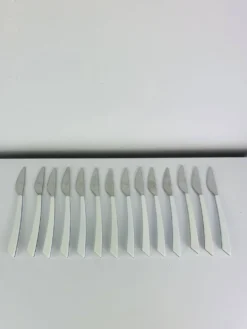 14 couteaux par Nathalie George pour Air France, inox, vintage