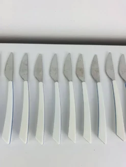 14 couteaux par Nathalie George pour Air France, inox, vintage