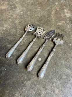 4 couverts à bonbon en argent chiffrés "HS"