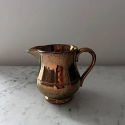 Crémier en porcelaine mordorée