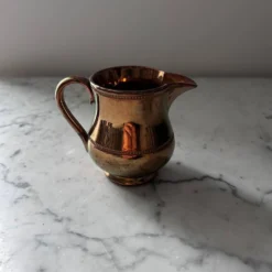 Crémier en porcelaine mordorée