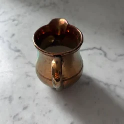 Crémier en porcelaine mordorée