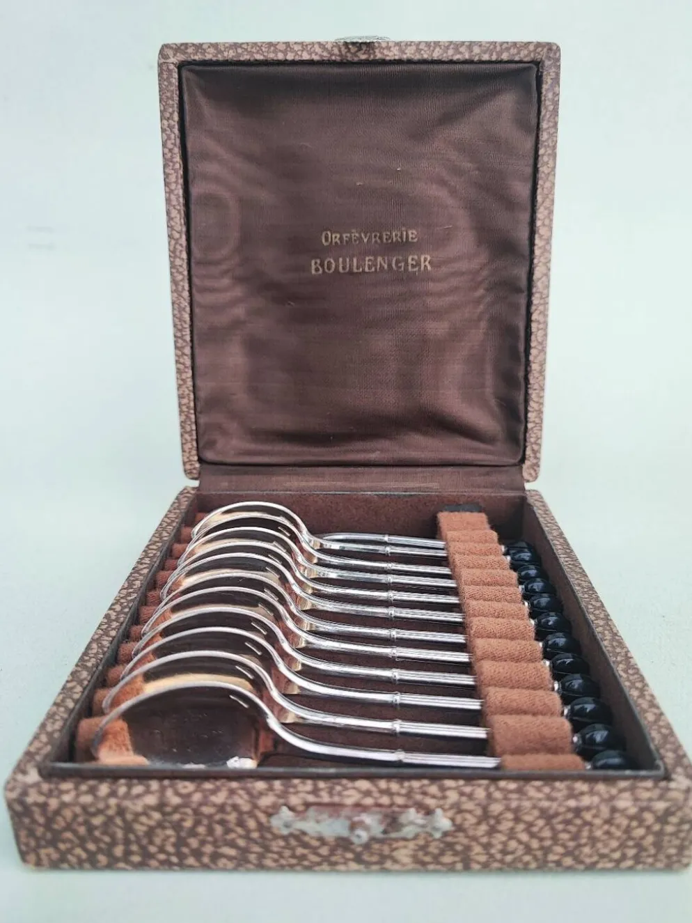 12 cuillères à moka en métal argenté