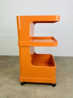 Desserte Flair pour Prisunic en plastique orange, seventies