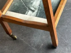 Desserte roulante ancienne en bois, miroir et décor sous verre – année