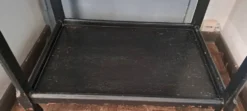 Desserte, table à roulettes, table d'appoint 1950 bois massif teinté noir