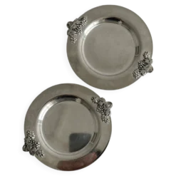 2 dessous de bouteille en métal brillant