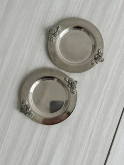 2 dessous de bouteille en métal brillant