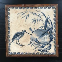 Dessous de plat ancien en céramique