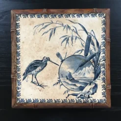 Dessous de plat ancien en céramique