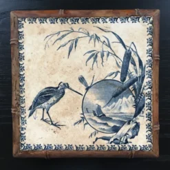 Dessous de plat ancien en céramique
