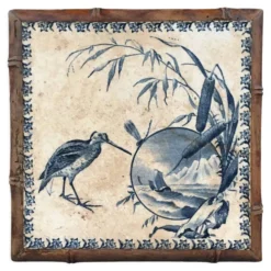 Dessous de plat ancien en céramique