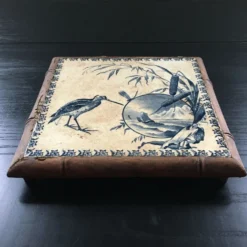 Dessous de plat ancien en céramique
