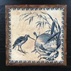 Dessous de plat ancien en céramique