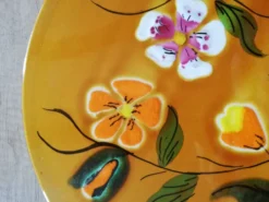 Dessous de plat ancien en céramique de Poet-Laval