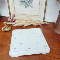 Dessous de plat en faïence fleurie