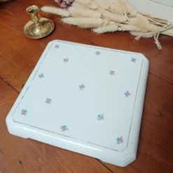 Dessous de plat en faïence fleurie