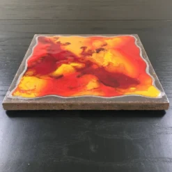 Dessous de plat en lave émaillée