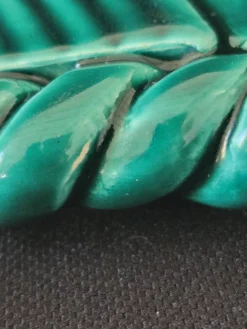 Dessous de plat et 2 dessous de bouteille en céramique vernissée verte, Vallauris
