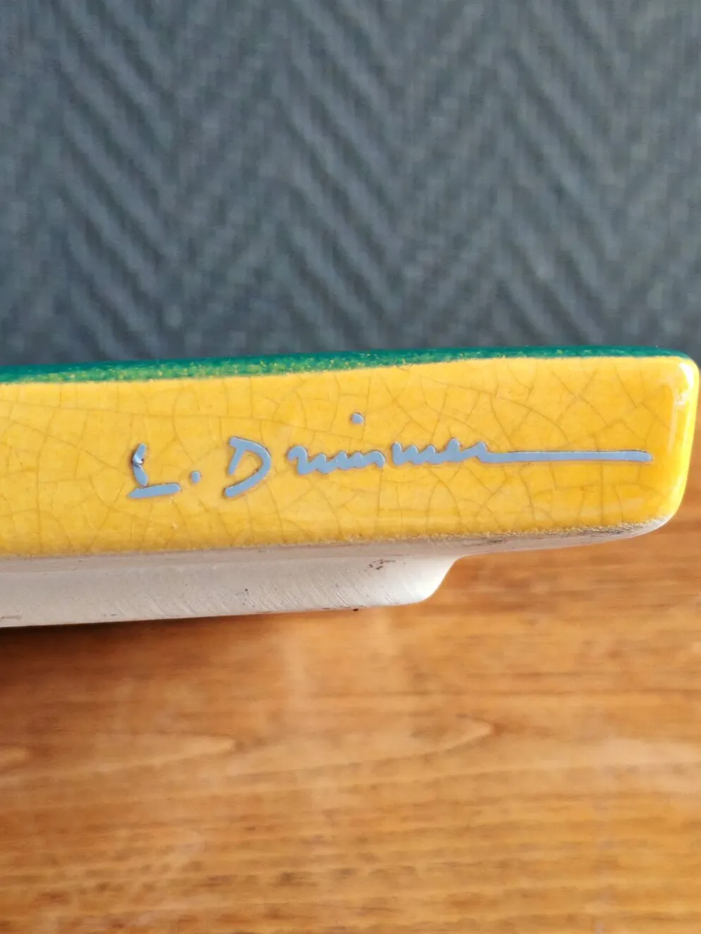 Dessous de plat signé l. drimmer en céramique émaillée jaune