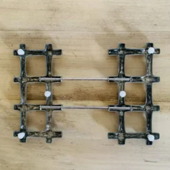 Dessous de table en métal argenté imitant le bambou